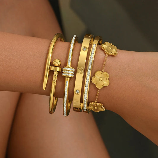 Hot Stainless Steel Four-Leaf Clover Lucky Bracelet – Fashion Gold Nail Bangle for Women