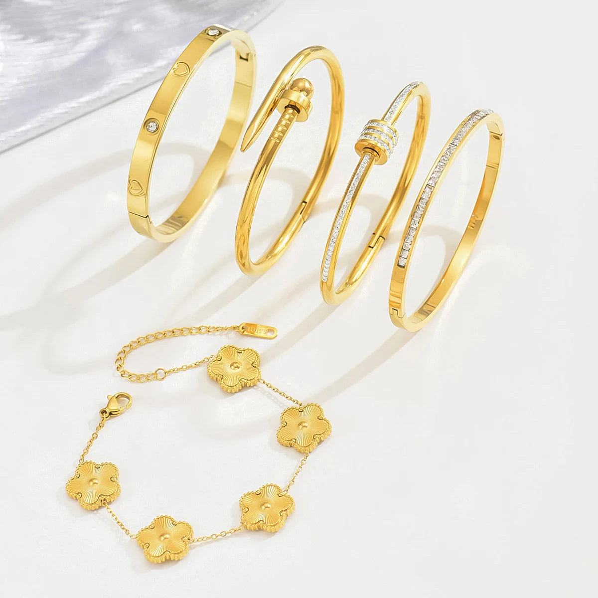Hot Stainless Steel Four-Leaf Clover Lucky Bracelet – Fashion Gold Nail Bangle for Women