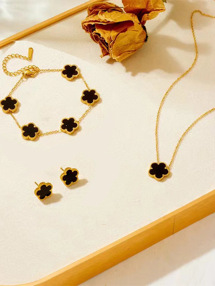 3-Piece Stainless Steel Plum Blossom Jewelry Set – Necklace, Bracelet & Earrings for Women